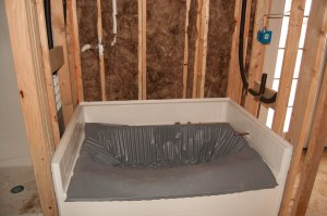 The tub in the master bathroom.